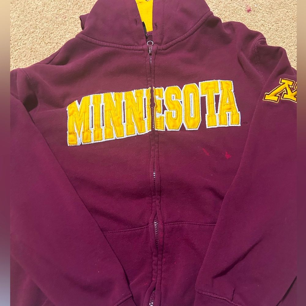 CUTE MN ZIP UP!! small stain on right side of zip up.